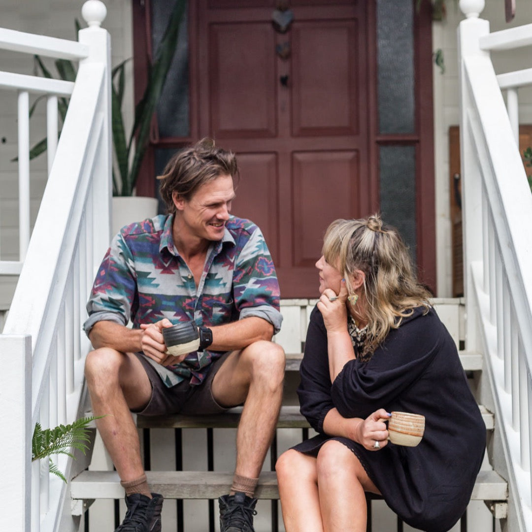 a couple drinking tea together and talking