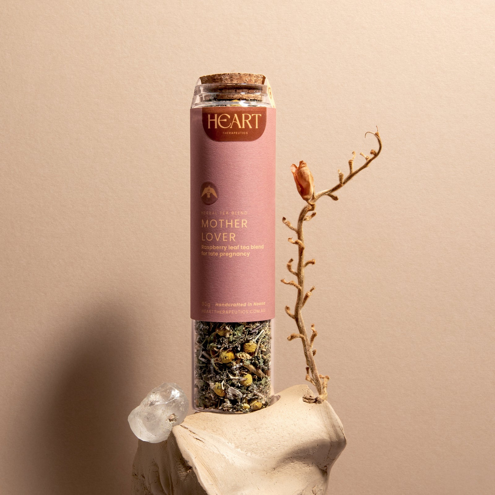 glass jar of herbal tea to support pregnancy