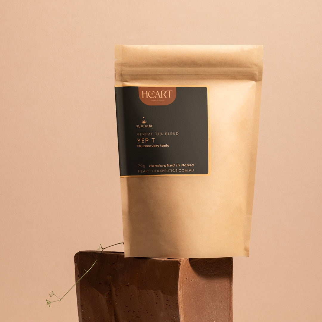 glass jar of organic herbal tea for colds and flus