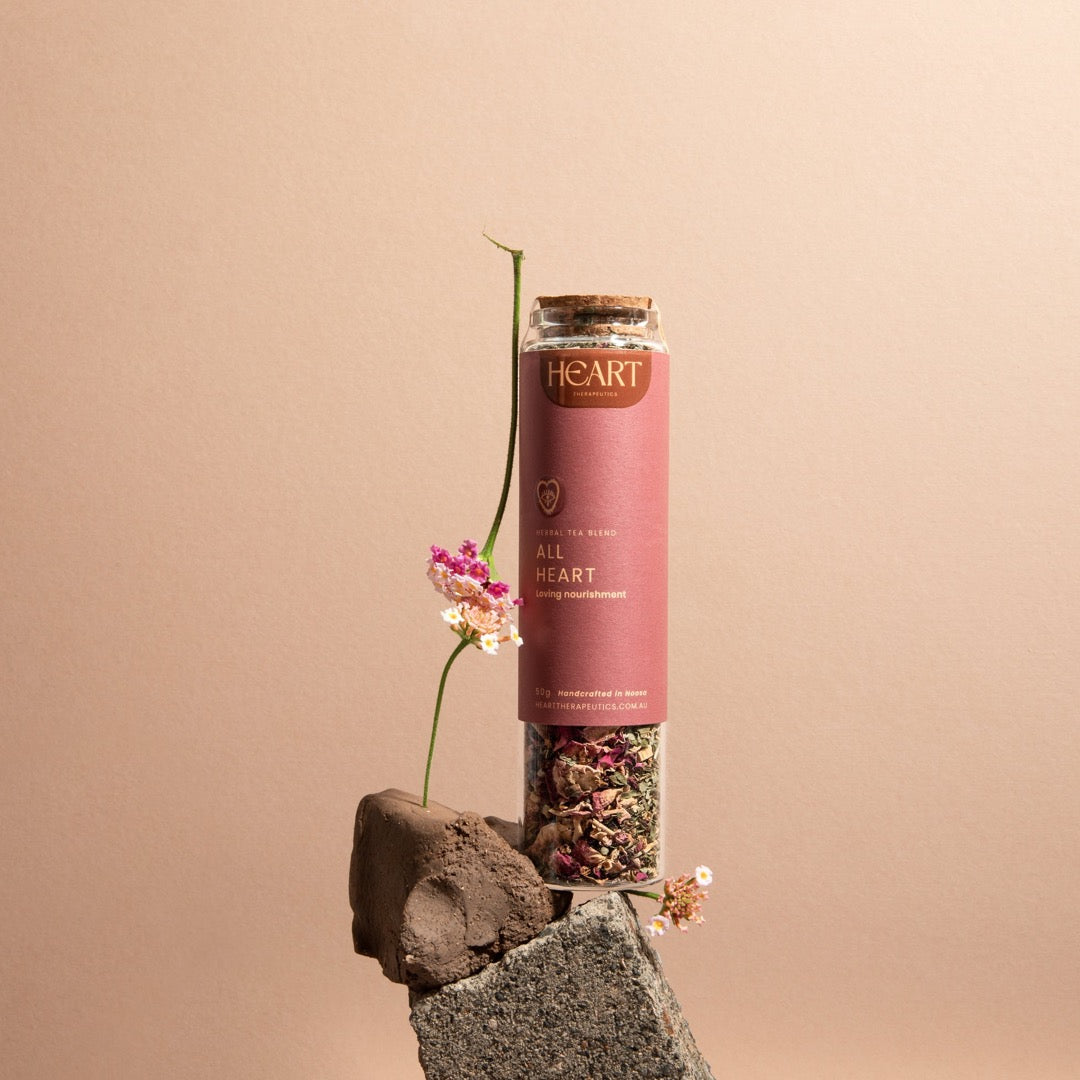 All Heart organic herbal tea in a glass jar