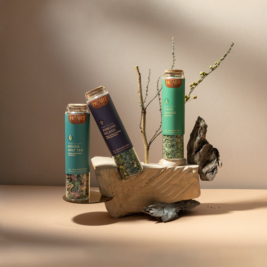 collection of herbal teas in glass jars