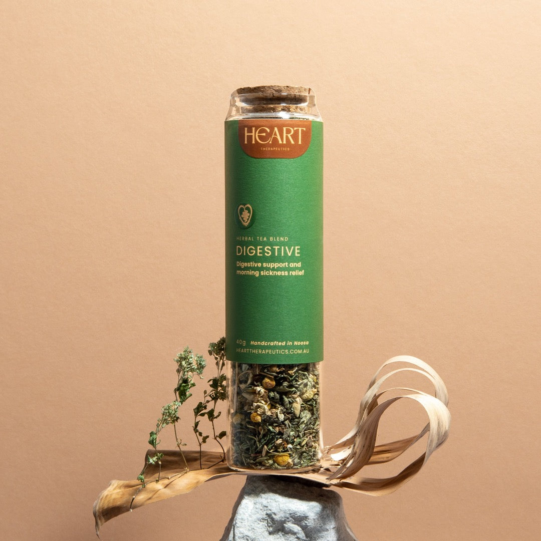 Glass jar of herbal tea for digestion